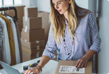 Business person shipping with USPS Ground Advantage.