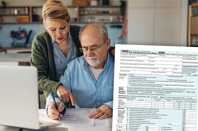An IRS form 1040 on desk with people in the background working on paperwork.